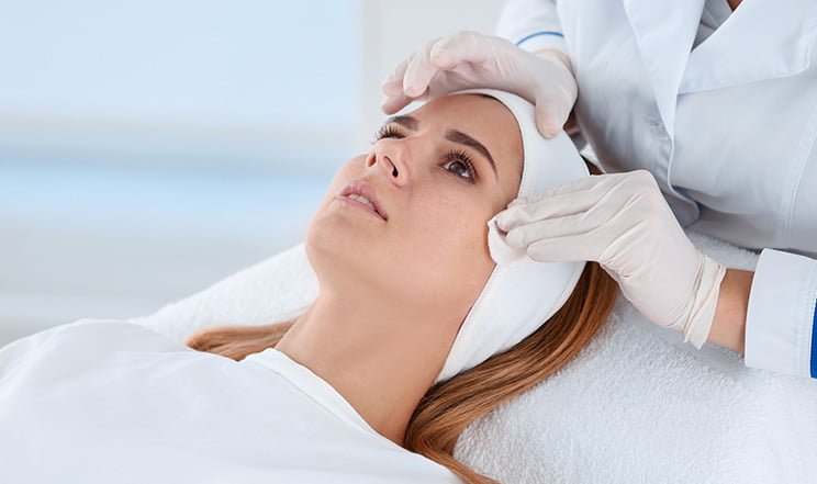 client going through dermal filler procedure
